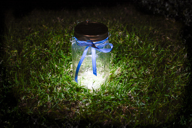 Consol Solar Jar lit at night