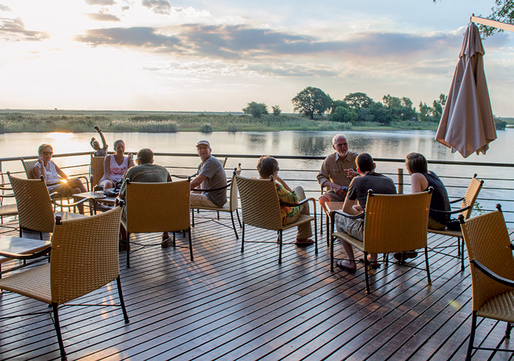 Sundowners on the deck at Chobe Safari Lodge.