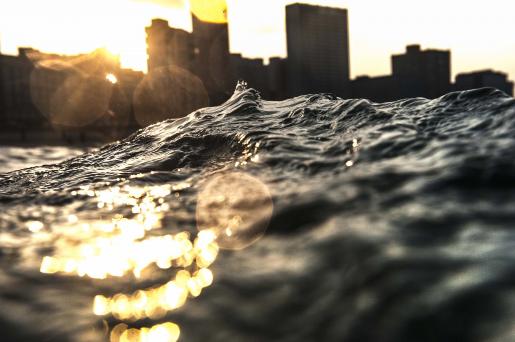 I recently returned to my hometown Durban and couldnt resist the warm waters of the Indian Ocean. As the late afternoon sun emerged through Durban's skyline I managed to freeze a few frames of the waves in the beautiful golden light.  Nikon D700 @ ISO500, 4000th sec, f/9