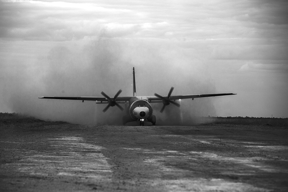 The dust kicked up by the CASA 235. Photo by Teagan Cunniffe. 
