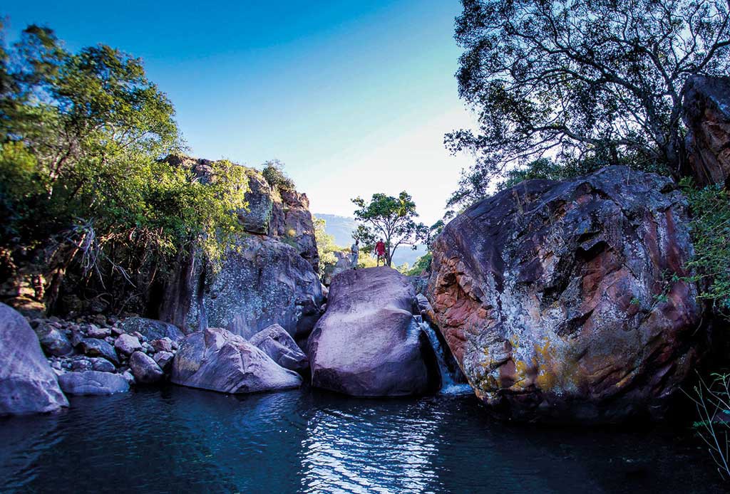Huge boulders surround the tranquil Pools of the Whites