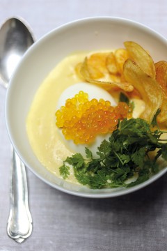 Tim Raues mustard egg is a soft-boiled egg in mustard sauce reloaded with caviar and potato crisps.