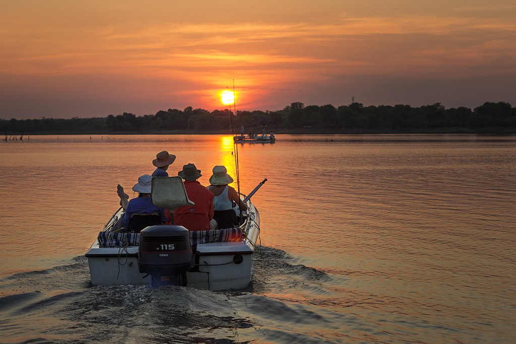Experience the most colourful sunsets on the peaceful water with family and friends. Photo by Josh Oates