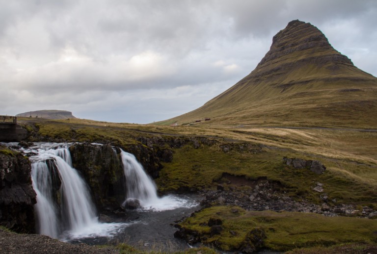 Kirkjufell Mountain, meaning 'Church Mountain' might be small (only 463 metres high) but together with the gentle flowing Kirkjufellfoss, it paints a beautiful backdrop to the charming west coast town of Grundarfjörður.