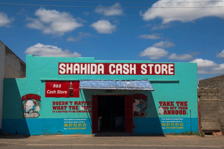 I loved the colour and creativity of the stores and businesses in Bongolethu, like this cash store.