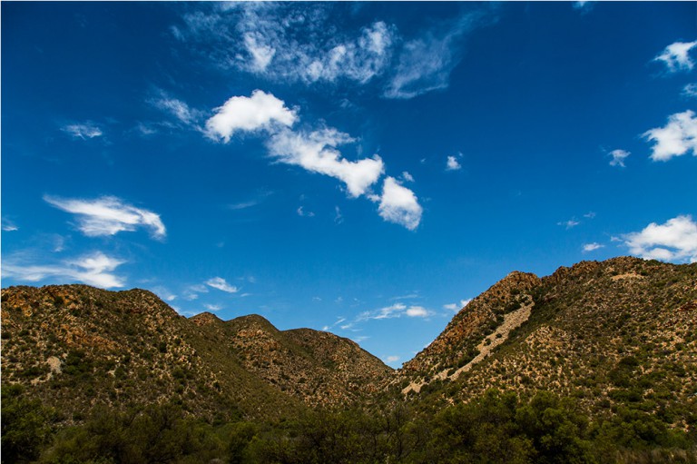 Leopard Trail - Deep blue skies and rugged, red-hued mountains provided the perfect contrast. 