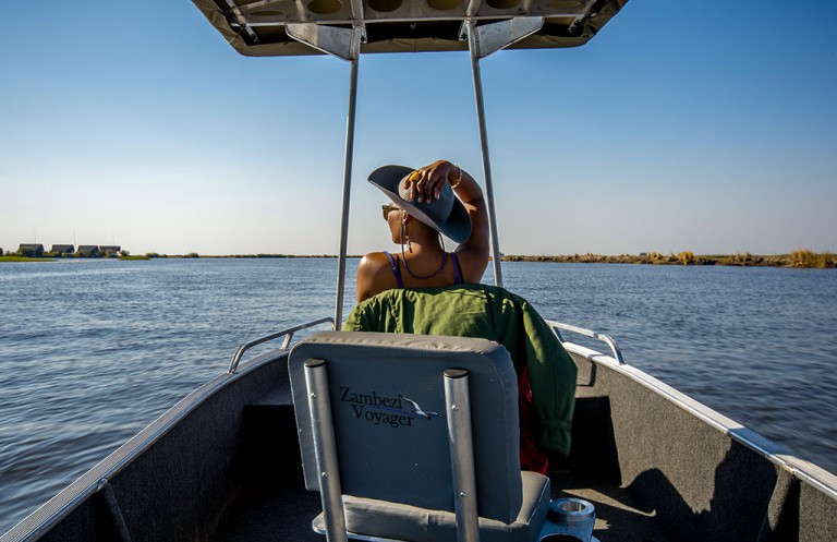Looking for game on the banks of the Chobe River. The Pangolin Voyager Houseboat has two vessels to use for game- spotting, fishing or visiting Impalila Island.