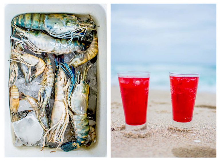 Fresh prawns on ice and colourful drinks on the beach. 