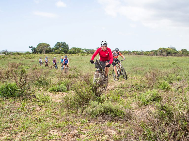 Andrew Zaloumis, CEO of iSimangaliso Wetland Park, tackles a section of the iSimangaliso MTB 4 day. Photo by Tyson Jopson. 
