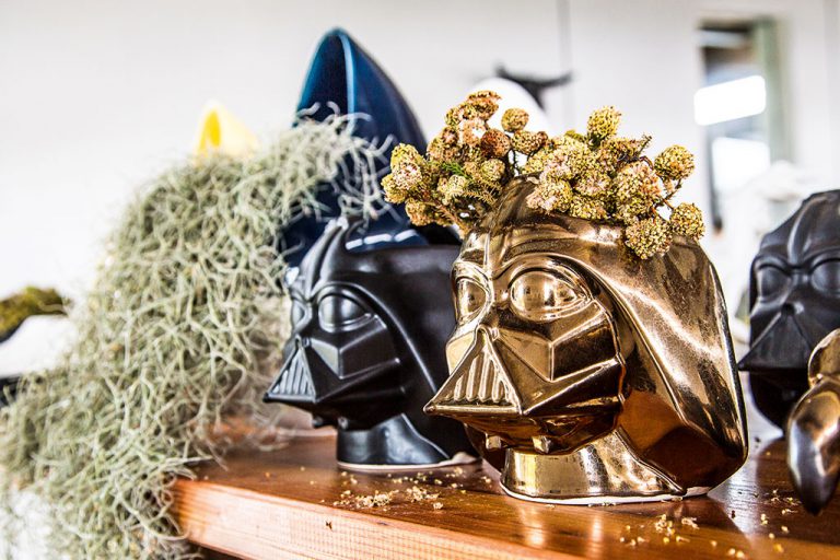 The ceramic factory puts a pop-culture spin on a classic art with items such as Darth Vader utensil holders. Photo by Tyson Jopson.  