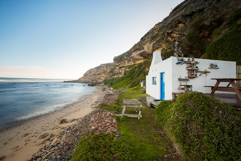 Okay, so this place is sort-of like a beach shack. It won't win any design awards- it's a functional space- but the location is breathtaking. You have to walk down a steep mountain to get to this spot, and your reward is an entire section of coastline all to yourself. 