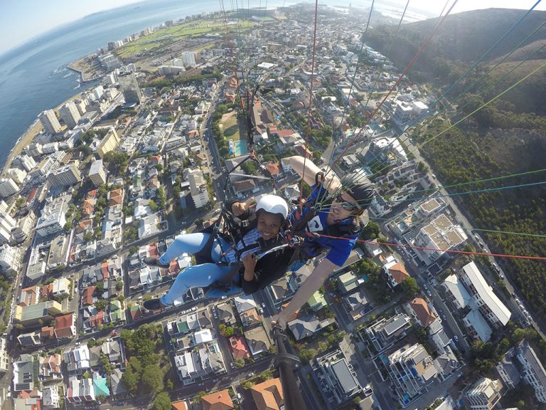 The big grin on my face was an implication that this is something, I must try again. Image taken by Cape Town Tandem Paraglide