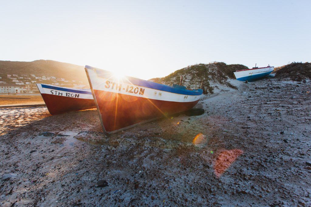 Fishing boats on the beach in Fish Hoek. Photo by Teagan Cunniffe.