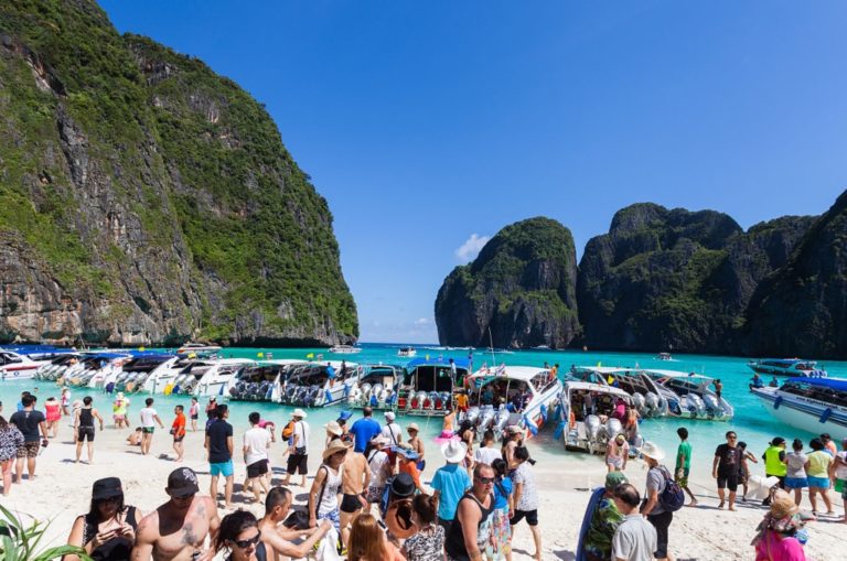 Maya Bay in Thailand has been closed because of crowds of tourists and boats which have damaged the island's coral. Photo: Diego Delso/Wikimedia Commons.