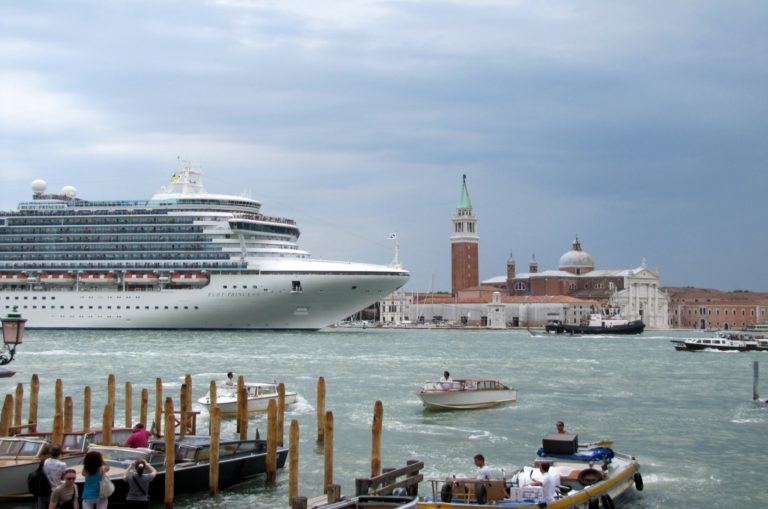 Cruise ships pass through the centre of the city, which residents say damage and pollute the city. Photo: Dan Davison/Flickr.