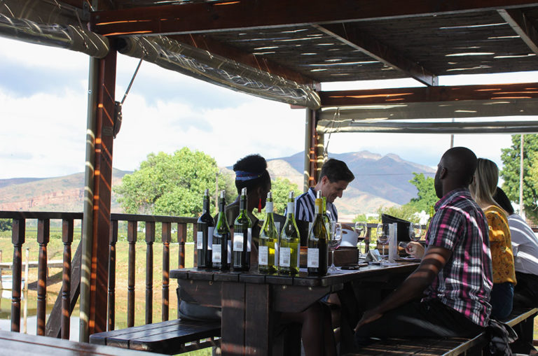 Enjoy a wine tasting on the deck stretching over the farm dam before you blend your own. Photo: Christi Nortier
