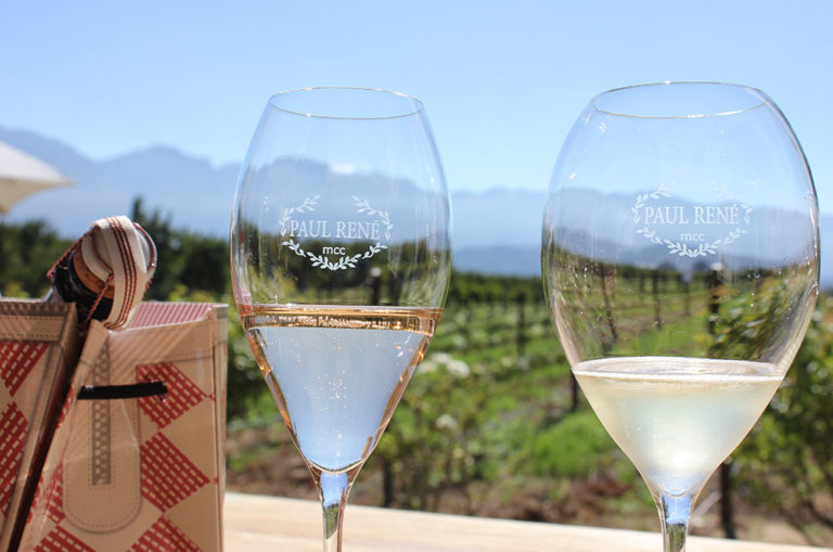 Shimmering bubbles, blue mountains and green vines at Wonderfontein Estate, the home of Paul René MCC. Photo: Christi Nortier.