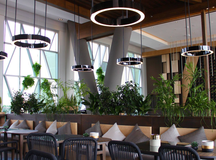 A dinning room view of the restaurant in The Maslow Time Square