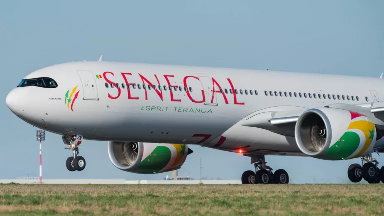 Air Sénégal aircraft, Dakar airport runway, Blaise Diagne International Airport, West Africa airline fleet, Senegal travel aircraft, Dakar city aerial view, Gorée Island Senegal, Casamance Senegal, African aviation expansion, Senegal national airline, Getaway Magazine