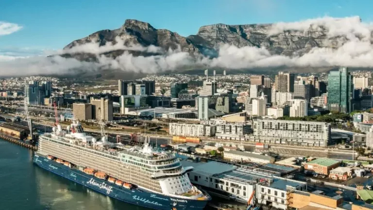 TUI Cruises ship Southern Africa, Mein Schiff 5 Cape Town port, Cape Town cruise terminal departure, Durban harbour cruise ship, Gqeberha port cruise tourism, Mauritius tropical island cruise stop, La Reunion coastline cruise destination, Richards Bay harbour South Africa, Namibia Atlantic coastline cruise, Indian Ocean cruise routes Africa, luxury cruise Southern Africa, Cape Town turnaround cruise hub, African cruise tourism growth, Getaway Magazine