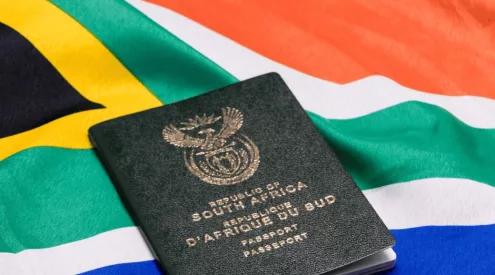 South African passport and Middle East passport, urgent travel alert South Africa, South African embassy building exterior, SA embassy registration notice, Middle East airport airspace disruption, stranded travellers airport Middle East, South Africans abroad safety alert, consular support South Africa, travel warning Middle East 2025, Getaway Magazine