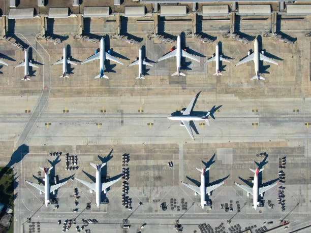 global air travel growth, airport expansion Africa, Asia Pacific aviation boom, crowded international airport runway, aircraft fleet growth, African airline routes, airport terminal development, aviation future trends, sustainable aviation fuels, Johannesburg airport travel hub, Getaway Magazine