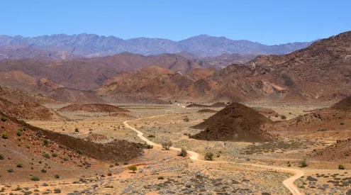 Richtersveld desert landscape, Ai Ais Richtersveld park terrain, Northern Cape 4x4 adventure, Fish River Canyon views, Orange River canoeing South Africa, desert succulent plants Richtersveld, remote travel South Africa, off grid camping Northern Cape, rugged mountain desert South Africa, Namibia border wilderness travel, Richtersveld fuel planning, SANParks travel warning, Getaway Magazine