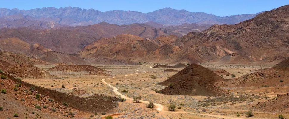 Richtersveld desert landscape, Ai Ais Richtersveld park terrain, Northern Cape 4x4 adventure, Fish River Canyon views, Orange River canoeing South Africa, desert succulent plants Richtersveld, remote travel South Africa, off grid camping Northern Cape, rugged mountain desert South Africa, Namibia border wilderness travel, Richtersveld fuel planning, SANParks travel warning, Getaway Magazine