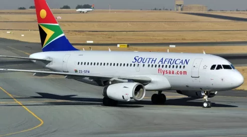 SAA Bitcoin payments South Africa, South African Airways crypto booking, Bitcoin flight payment Africa, airline fintech innovation Africa, Ozow payment processing aviation, MoneyBadger crypto conversion South Africa, African travel payment systems, aviation settlement technology Africa, digital payments travel industry Africa, Getaway Magazine